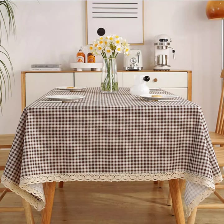 The Brown Gingham Tablecloth on a dining table
