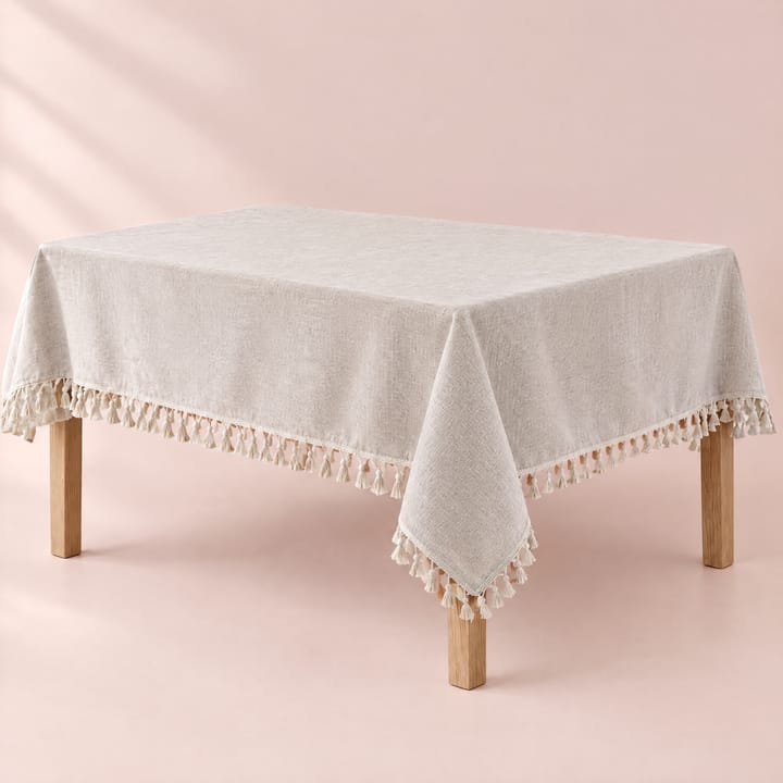 Oatmeal tablecloth with a cream tassel trim